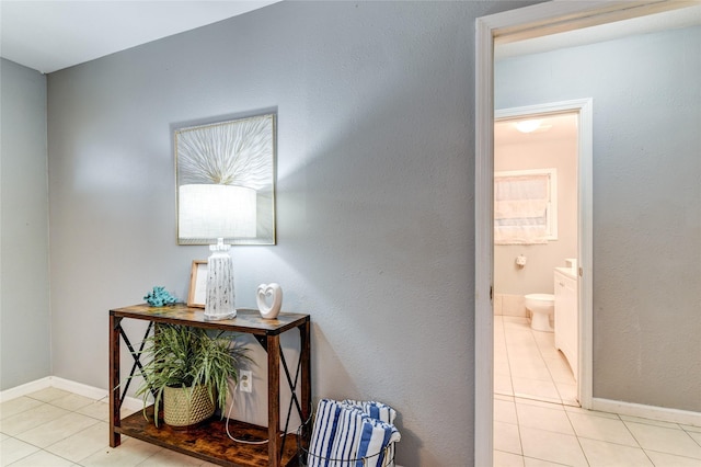 hallway with light tile patterned flooring