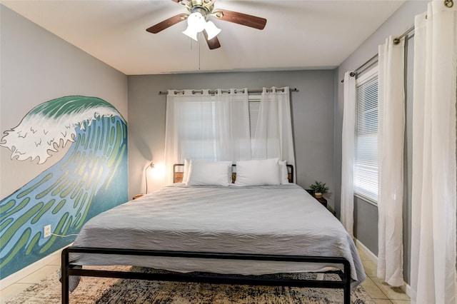 bedroom featuring tile patterned flooring and ceiling fan