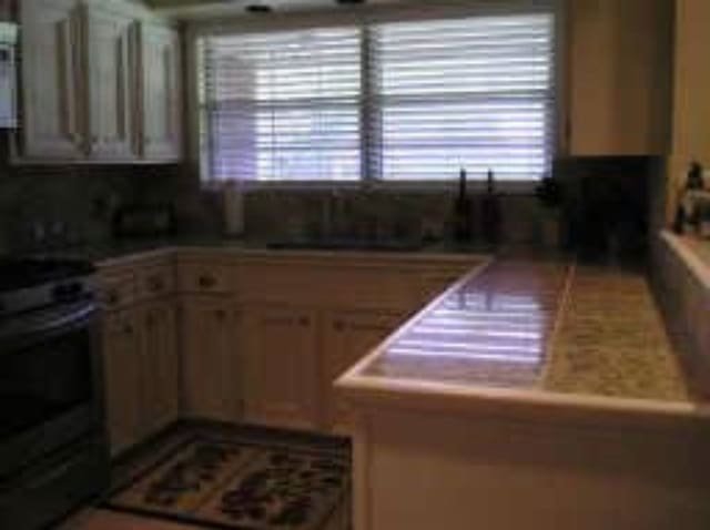 kitchen with black electric range oven