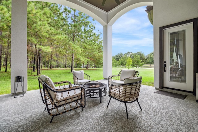 view of patio featuring an outdoor fire pit