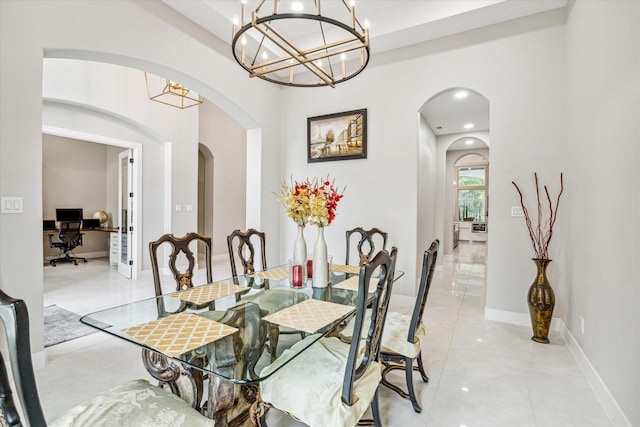 dining area featuring light tile patterned floors