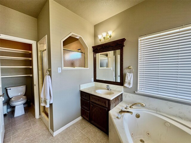 full bathroom with tile patterned floors, vanity, toilet, and independent shower and bath