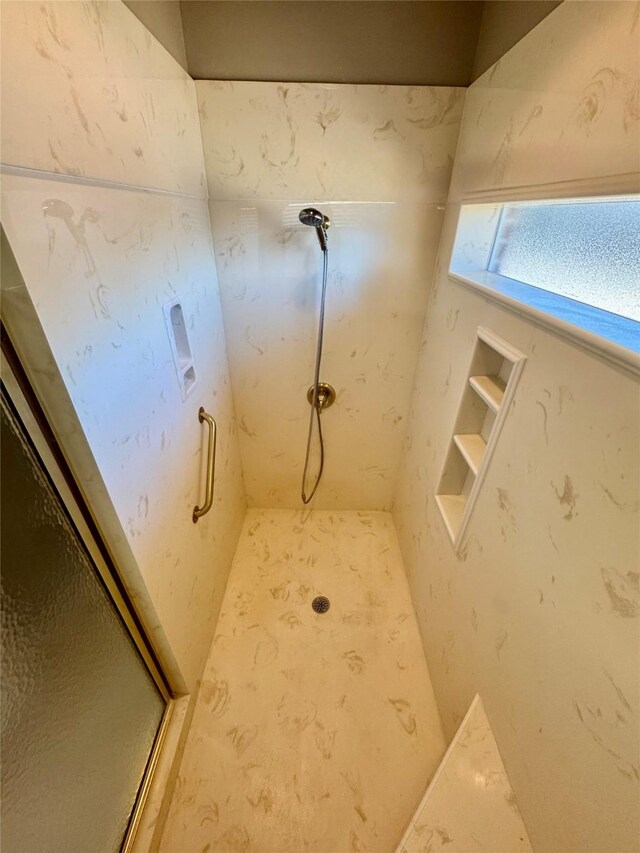 bathroom with an enclosed shower