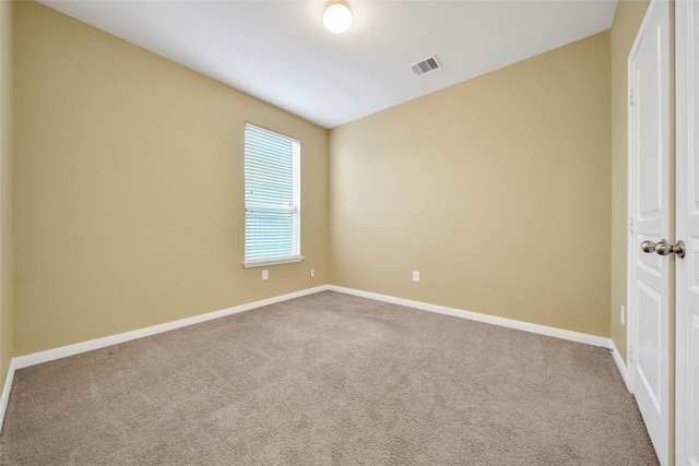 empty room featuring carpet flooring