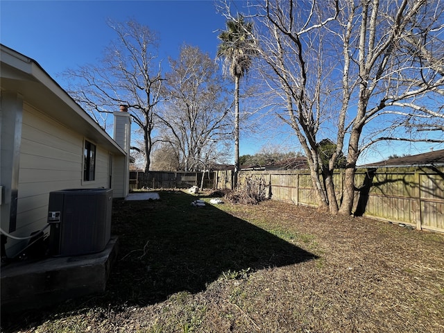 view of yard featuring central AC