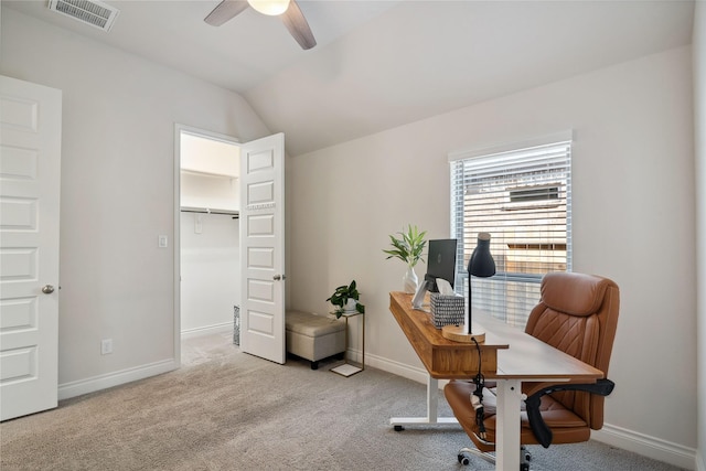 office with ceiling fan, lofted ceiling, and light carpet