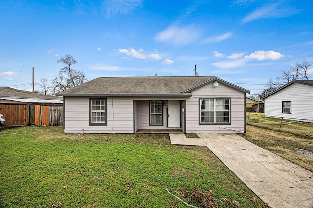 ranch-style home with a front yard