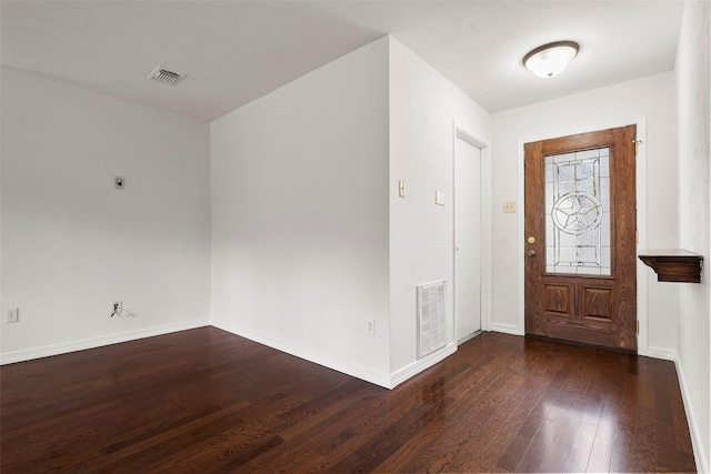 foyer featuring dark wood-type flooring