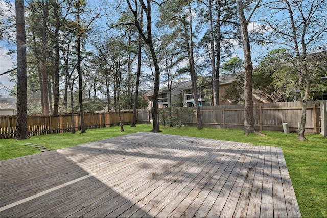 wooden terrace with a yard