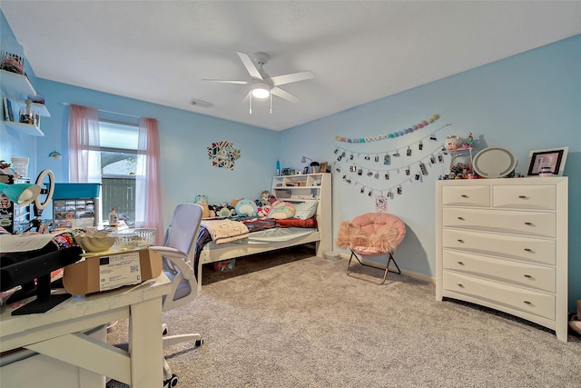 bedroom with ceiling fan and light carpet