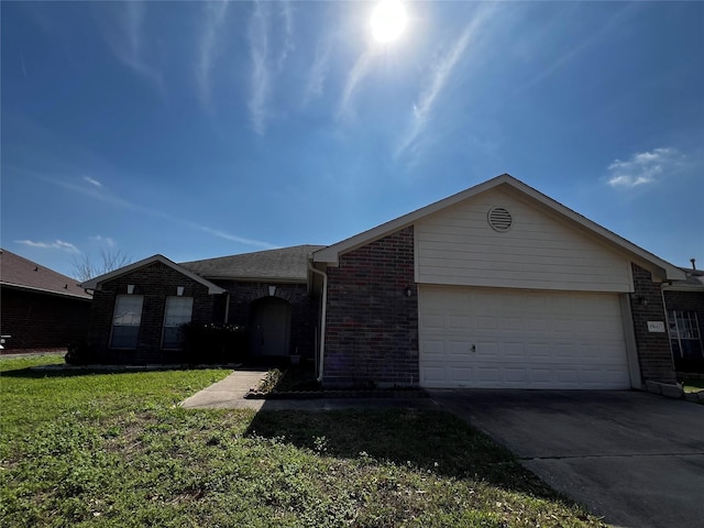 single story home with a garage and a front lawn