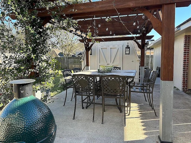 view of patio / terrace featuring a storage shed and a pergola