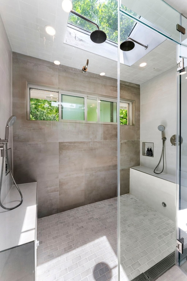 bathroom with a tile shower