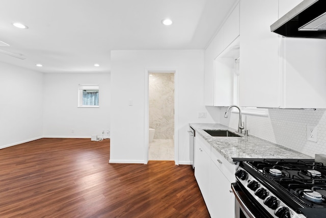 kitchen featuring ventilation hood, sink, white cabinets, dark hardwood / wood-style flooring, and light stone countertops