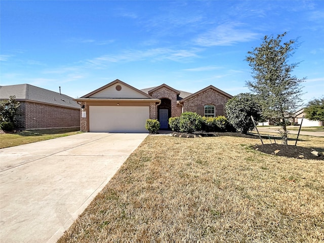 ranch-style house featuring a garage and a front lawn