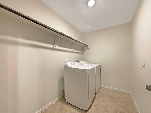 laundry room with washer and clothes dryer