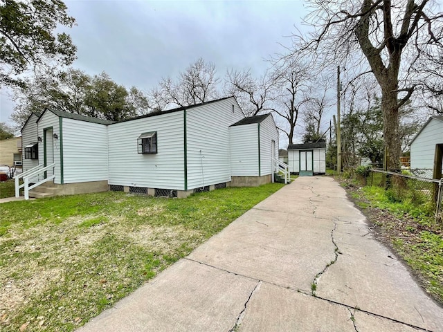 view of property exterior with a yard