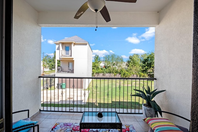 balcony featuring ceiling fan