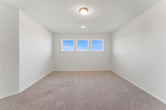 unfurnished room with carpet