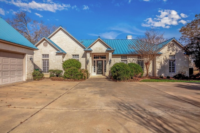 view of front of property featuring a garage