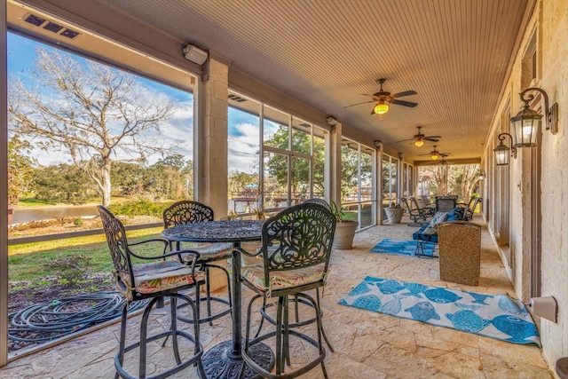 sunroom / solarium with wooden ceiling