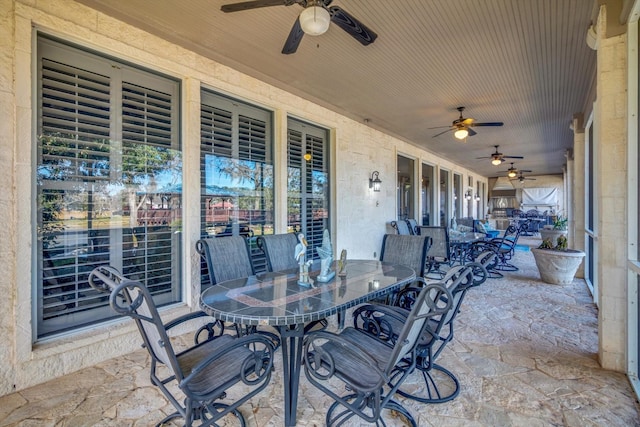 view of patio with ceiling fan