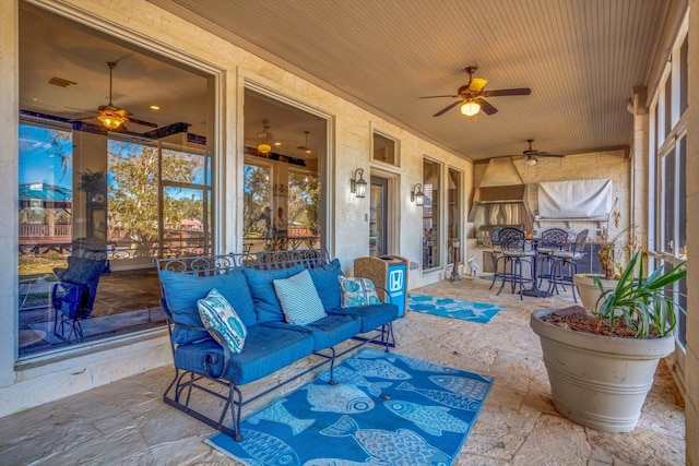 view of patio / terrace with french doors, ceiling fan, and outdoor lounge area