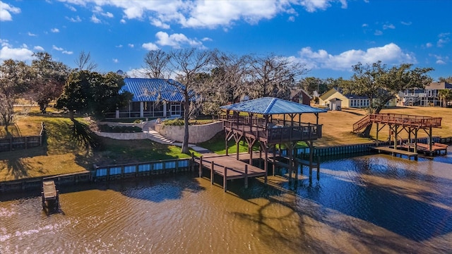 view of dock with a water view and a gazebo