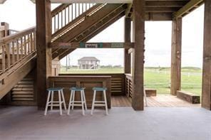 view of patio / terrace featuring an outdoor bar