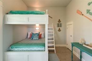 bedroom featuring wood-type flooring