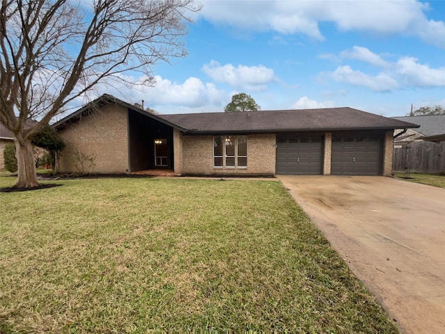 single story home with a garage and a front yard