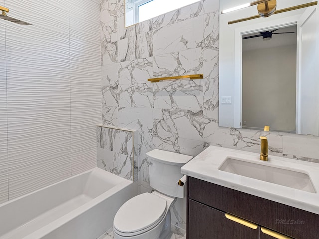 full bathroom featuring tile walls, backsplash, tiled shower / bath combo, vanity, and toilet