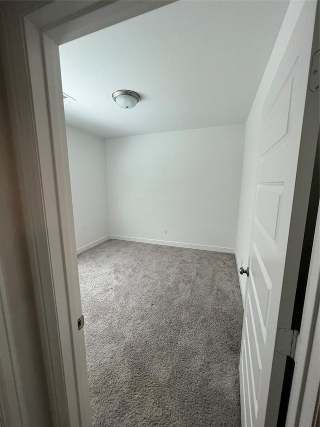 spare room with carpet floors