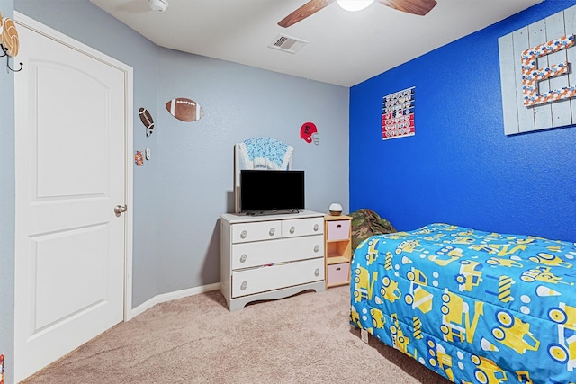 carpeted bedroom with ceiling fan