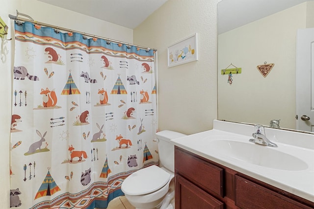 bathroom featuring vanity, a shower with curtain, and toilet