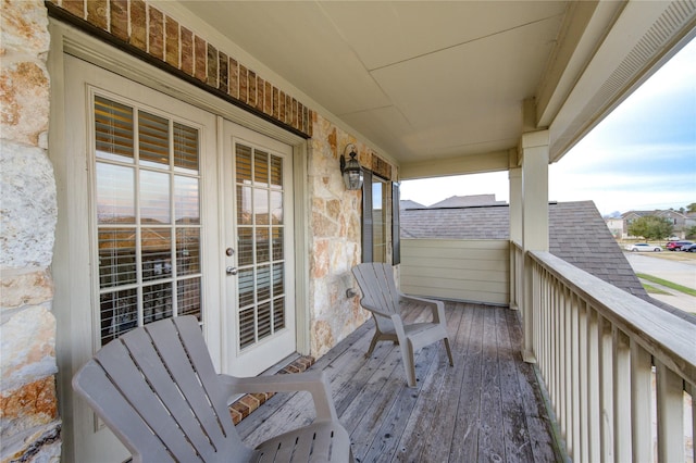 balcony featuring french doors