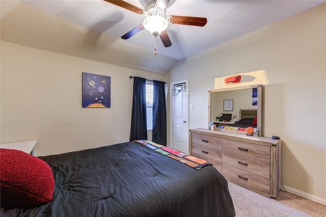 bedroom with lofted ceiling, light carpet, and ceiling fan