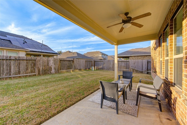 view of patio with ceiling fan