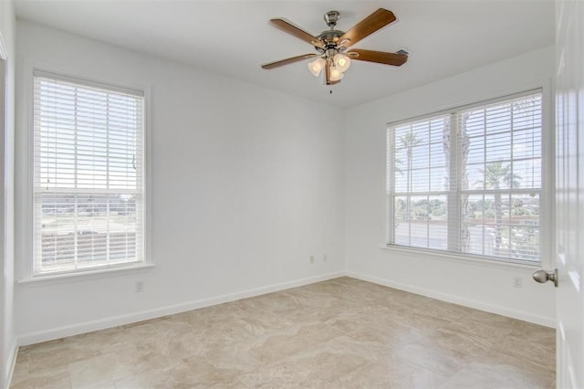 empty room featuring ceiling fan