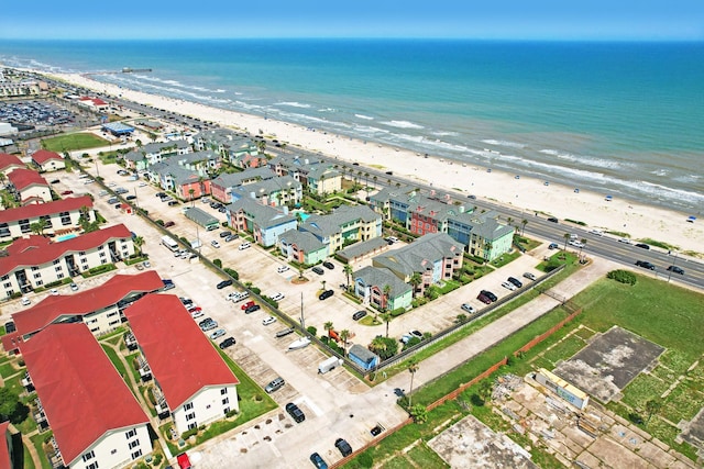 aerial view featuring a view of the beach and a water view