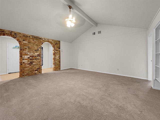 unfurnished living room featuring lofted ceiling with beams, carpet floors, and ceiling fan