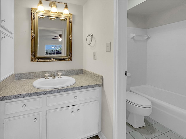 full bathroom with tile patterned flooring, vanity, shower / bathing tub combination, and toilet