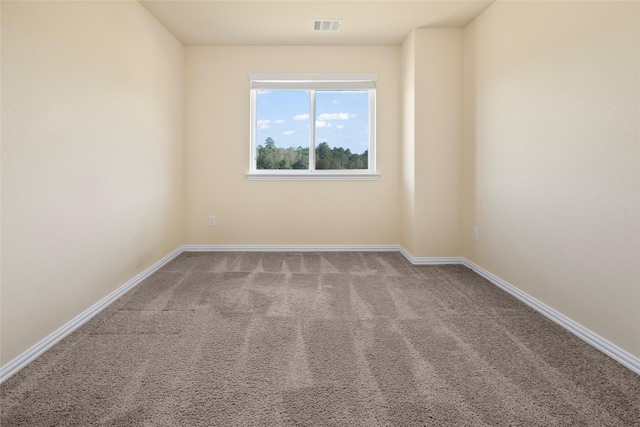 unfurnished room featuring carpet floors