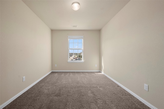 spare room with carpet