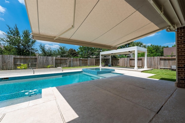 view of swimming pool featuring a patio area and an in ground hot tub