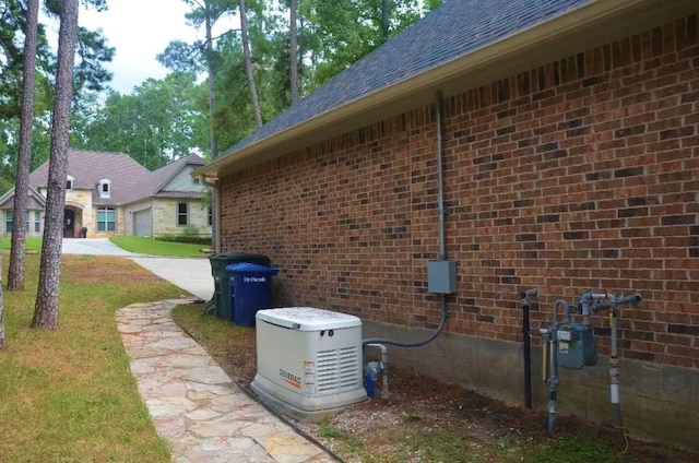 view of property exterior featuring a lawn