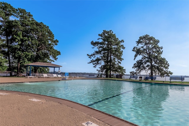 view of swimming pool with a gazebo