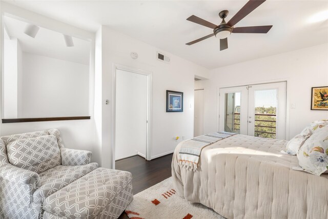 bedroom featuring dark wood-type flooring, access to exterior, ceiling fan, and french doors