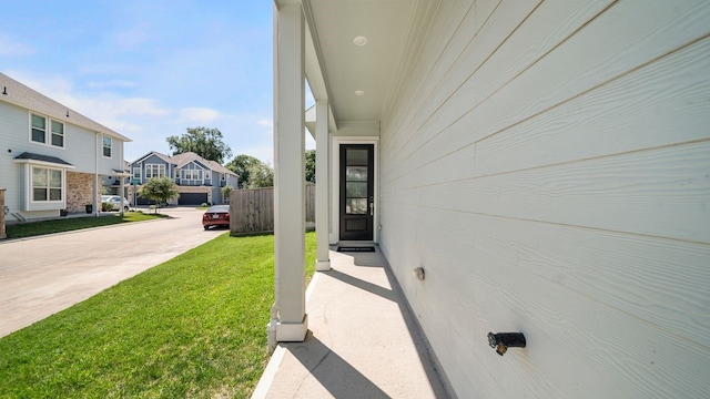 property entrance featuring a yard