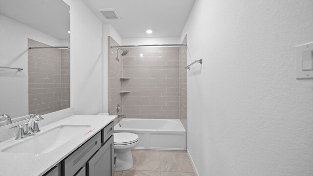 214 Fulton Station Dr, Houston, TX 77009 - bathroom with tile patterned floors, toilet, visible vents, shower / washtub combination, and vanity